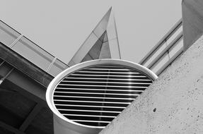 Black and white photo of the architectural design of the building, with the glass