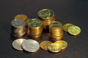 stacks of golden money savings