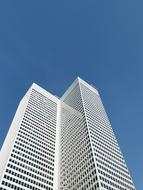 high-rise white commercial building, low angle view