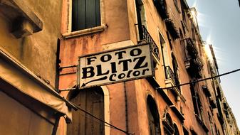 photo studio sign on a street in Venice