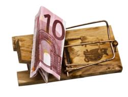 Colorful "10" Euro banknote in a mousetrap, at white background