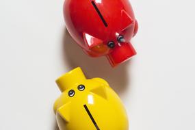 red and yellow Piggy Banks