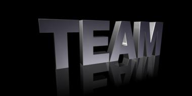 Gray, 3d "TEAM" sign, at black background on clipart