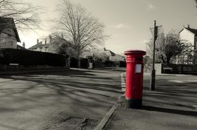 Red Mailbox on street in England