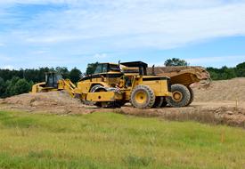 heavy machinery and tractor on a sand pit