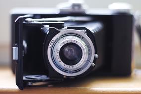 retro camera close-up on blurred background