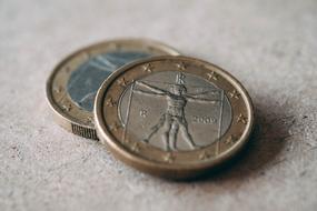 two metal coins, close-up