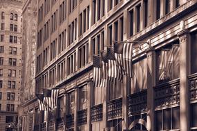 american flags on the building in new york