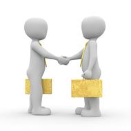 businessmen figures shaking hands