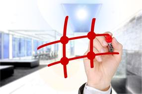 Person, drawing red "Network" sign, in the office, clipart