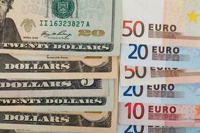 Colorful Dollar and Euro banknote, with the numbers and patterns