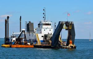 Dredger Boat on ocean