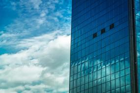 open three windows in a modern glass building