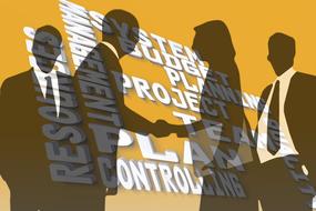 shadows of businessmen on the background of inscriptions