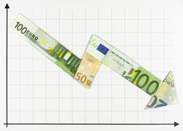 Arrow made of the colorful Euro banknotes, on the graph, with the arrow going down, at checkered background, clipart