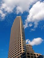 modern office skyscraper with blue sky background