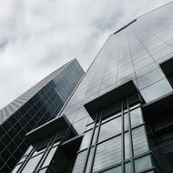 contemporary office Building Perspective at cloudy sky