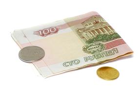 Russian money with coins on a white surface