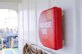 fire hose box on wall