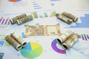 money on charts and graphs