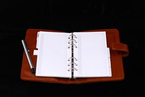 brown leather notebook