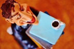 Close-up of the figure of a tax consultant with the papers and cup of coffee