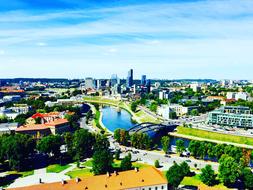panoramic view of the city near the river on a sunny day