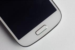 part of white smartphone