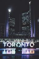 night photo of skyscrapers in Toronto