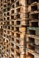 stacks of wooden pallets in industry