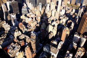 Beautiful cityscape with the buildings and Empire State Building in light, in Manhattan, New York, USA