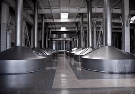 silvery equipment in an industrial area