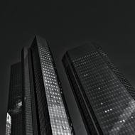 Black and white photo of the Deutsche bank building and other, in Frankfurt, Germany, at the night
