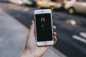 photo of iphone in hand