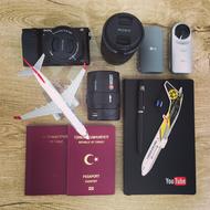 Colorful stuff, airplane model, devices and passport of Turkey, for travelling