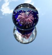 glass ball with pink flower