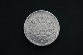 Beautiful silver Ruble coin of 1897 at black background