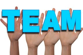 hands and blue lettering team