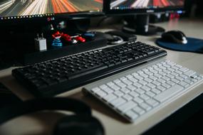 Close-up of the colorful computer devices on the desk