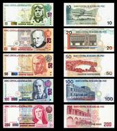 Colorful banknotes of Peru, of different values, at black background, clipart