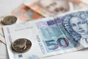 coins and banknotes of croatia close up in blurred background