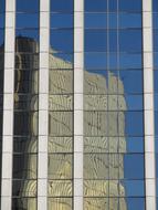 Reflection of the building in the windows of the building in Dallas, Texas, USA