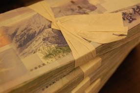 stacks of taiwan dollars, close-up