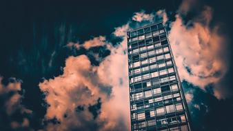 modern tower on the background of evening clouds