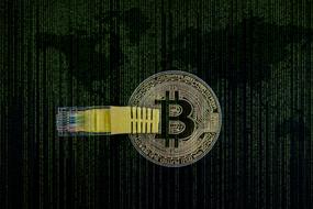 bitcoin symbol on binary code background