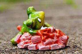 Money Soothes Sleep green frog