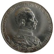 Shiny, metal coin with profile portrait, at white background