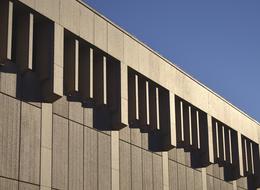 the upper part of the facade of the business building