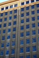 modern facade with blue windows close up