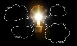 empty thought bubbles around shining light bulb, drawing